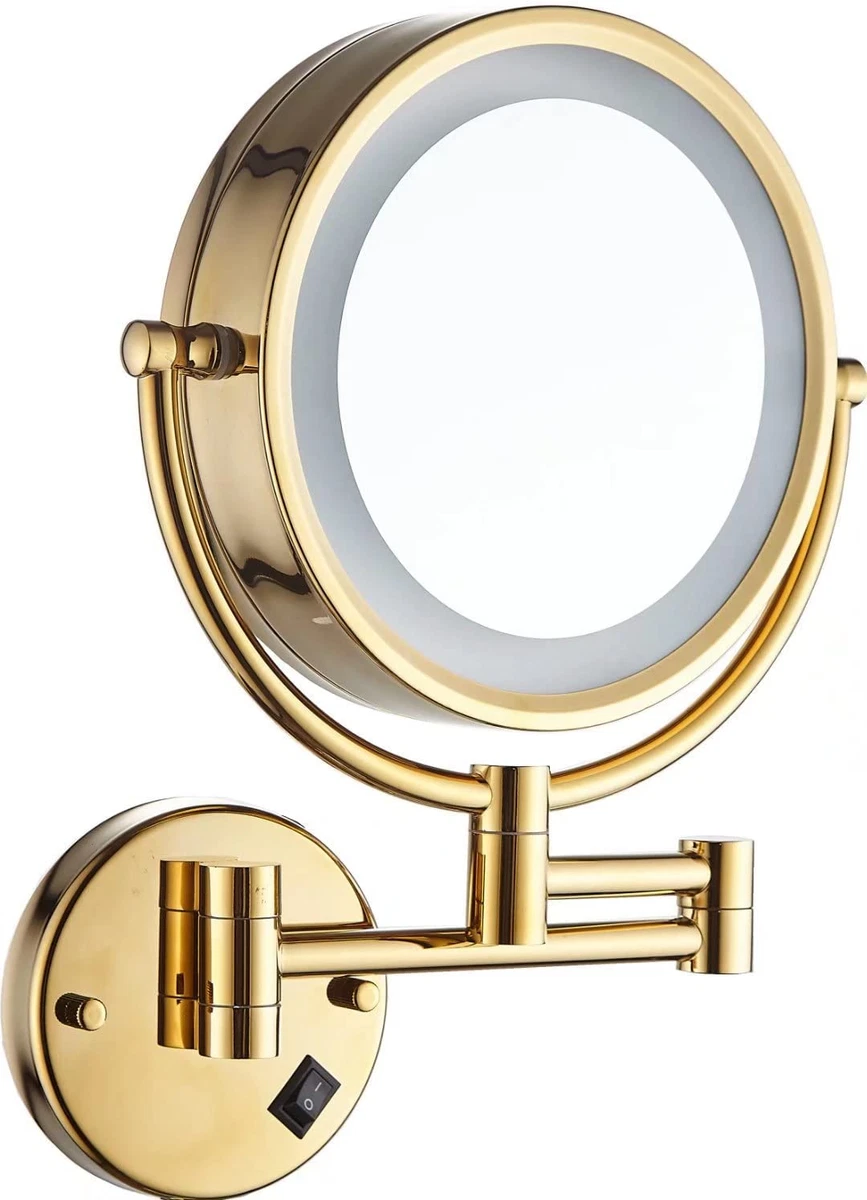Makeup mirror with lights attached to wall outlet