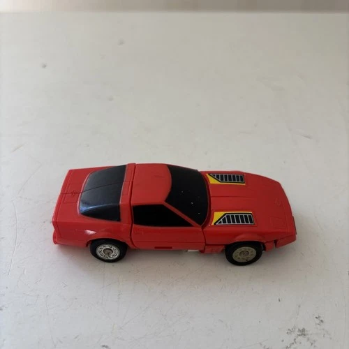 1984 TONKA BANDAI Vintage Go Bots Puzzler Head “Tic Tac” Red Corvette Gobots