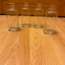 Set of 4 Glass Jars With Gold Lids