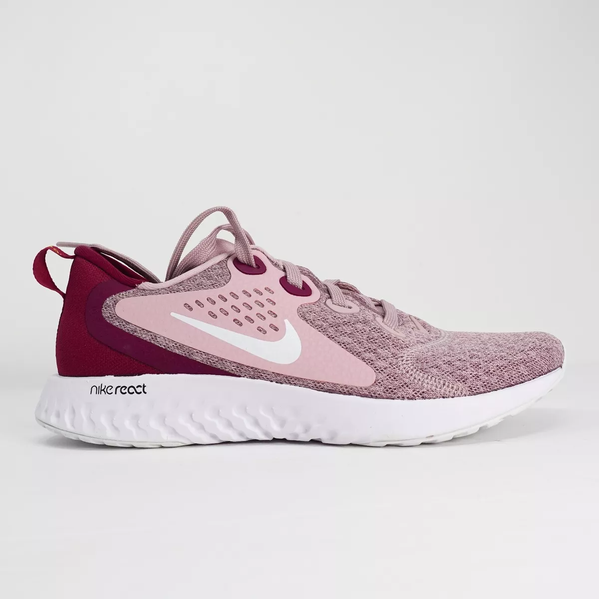 Nike legend react store women's white