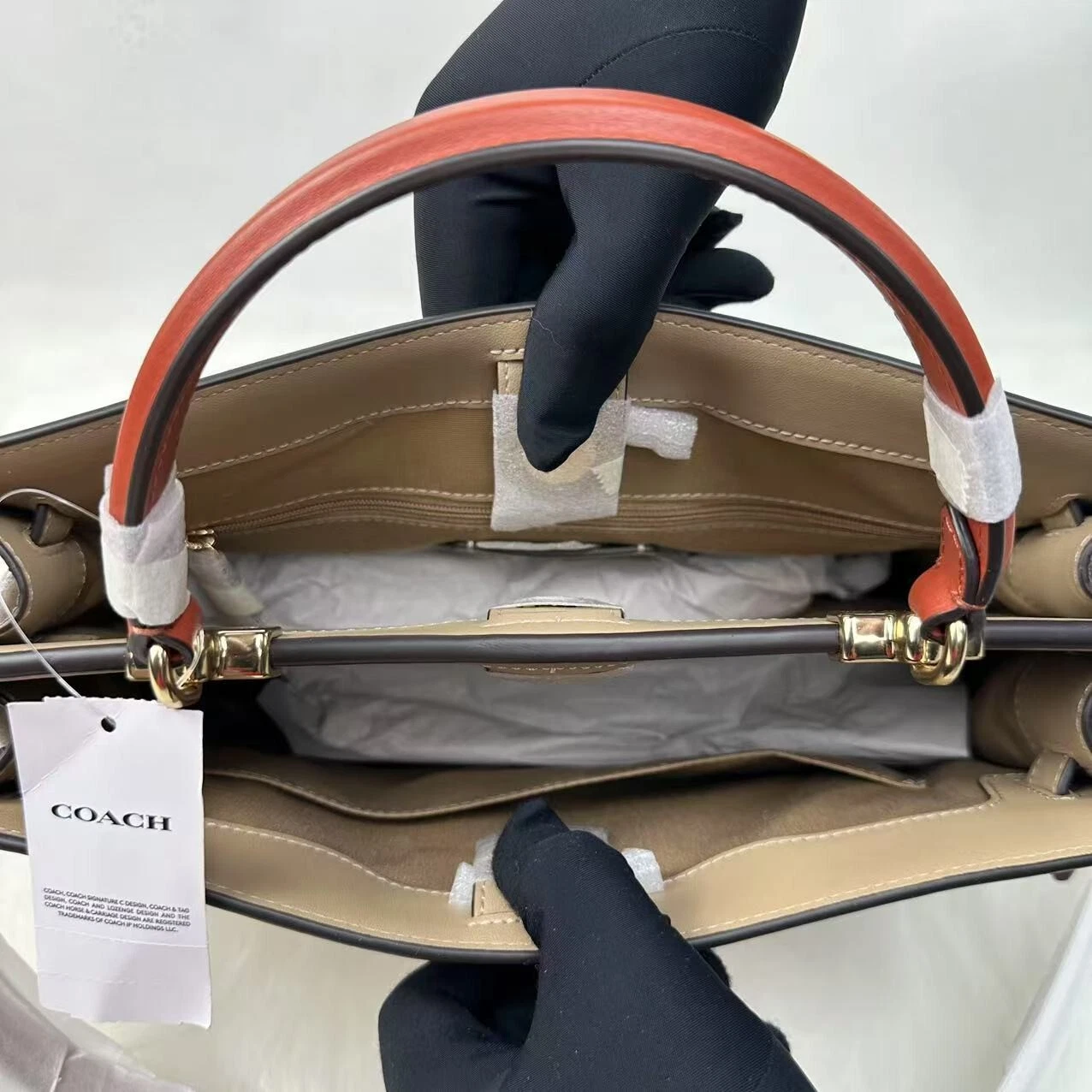 Borsa a tracolla Coach Lane in tela colorblock firma gesso cachi C8208