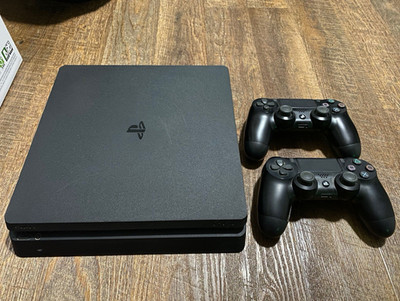Sony PlayStation 4 Slim 1TB Black Console w/ 2 DualShock 4 Wireless Controllers