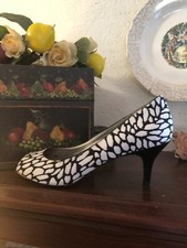 Women's Low Heels by Bandolino, size 8 black and white pumps,with open toe