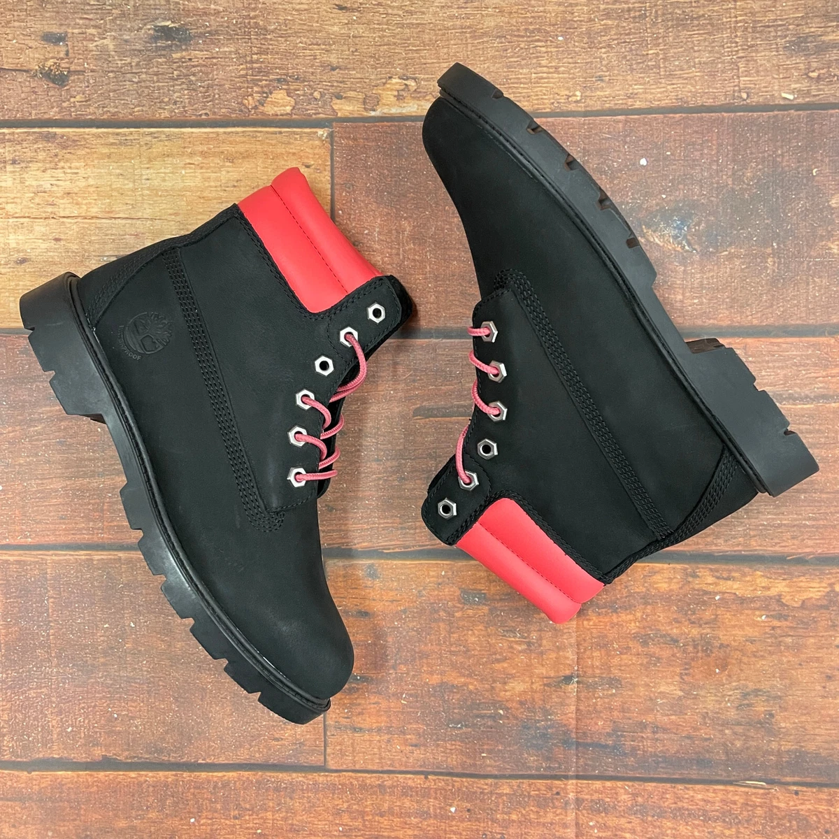 Pink and best sale black timberland boots