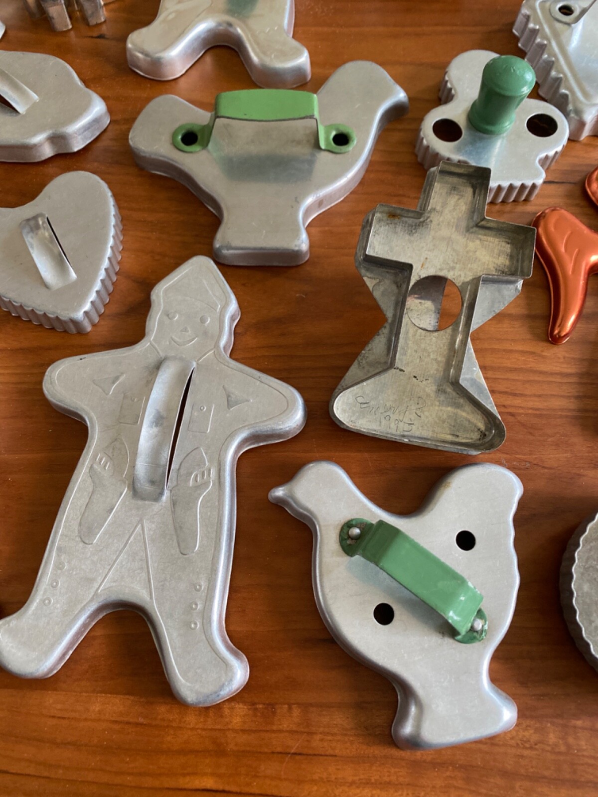 Lot of 24 Vintage Metal Cookie Cutters with Handles some Green