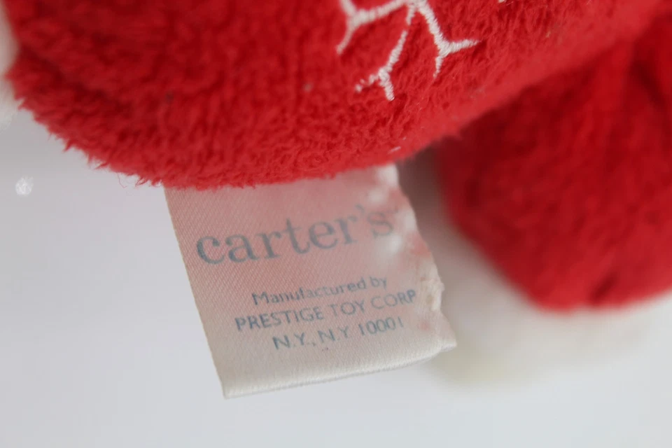 Feliz Navidad Bebé Niña Muñeca Tela Suave Relleno Peluche Sonajero Juguete Rubio Carters Foto 3 de 4