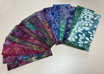 Set of Sixteen Batik Fabric Rotary Cut 2 1/2'' Wide Strips Blues Reds Purples