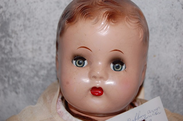 magic face baby doll