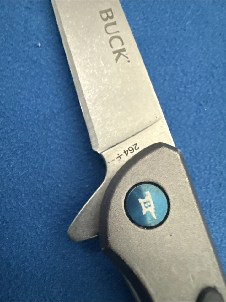 Cuchillos Buck 264 Cavalier mango de aluminio y fibra de carbono + billetera Ninja Foto 3 de 4