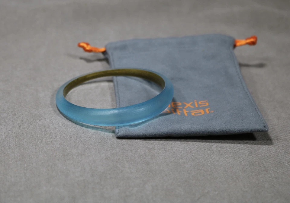Beautiful Alexis bitter aqua blue lucite bangle bracelet
