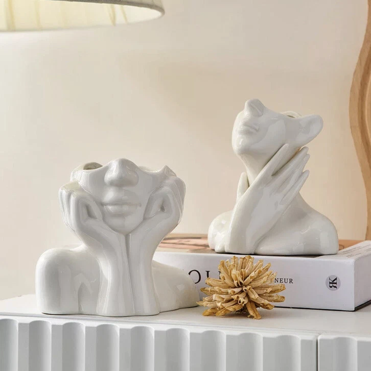 Decorative face vase statue