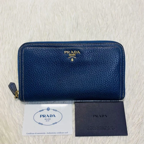 Portefeuille long zippé PRADA bleu marine ferrures métal authentique