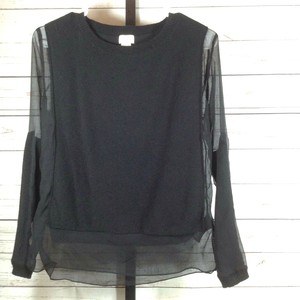 black sweater with sheer sleeves