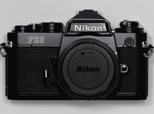 NEW, UNUSED Nikon FE2 35mm SLR Black Camera W/ Titanium Shutter Black Camera