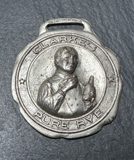 ANTIQUE 3D METAL ADVERTISING FOB: CLARKE'S PURE RYE WHISKEY N118