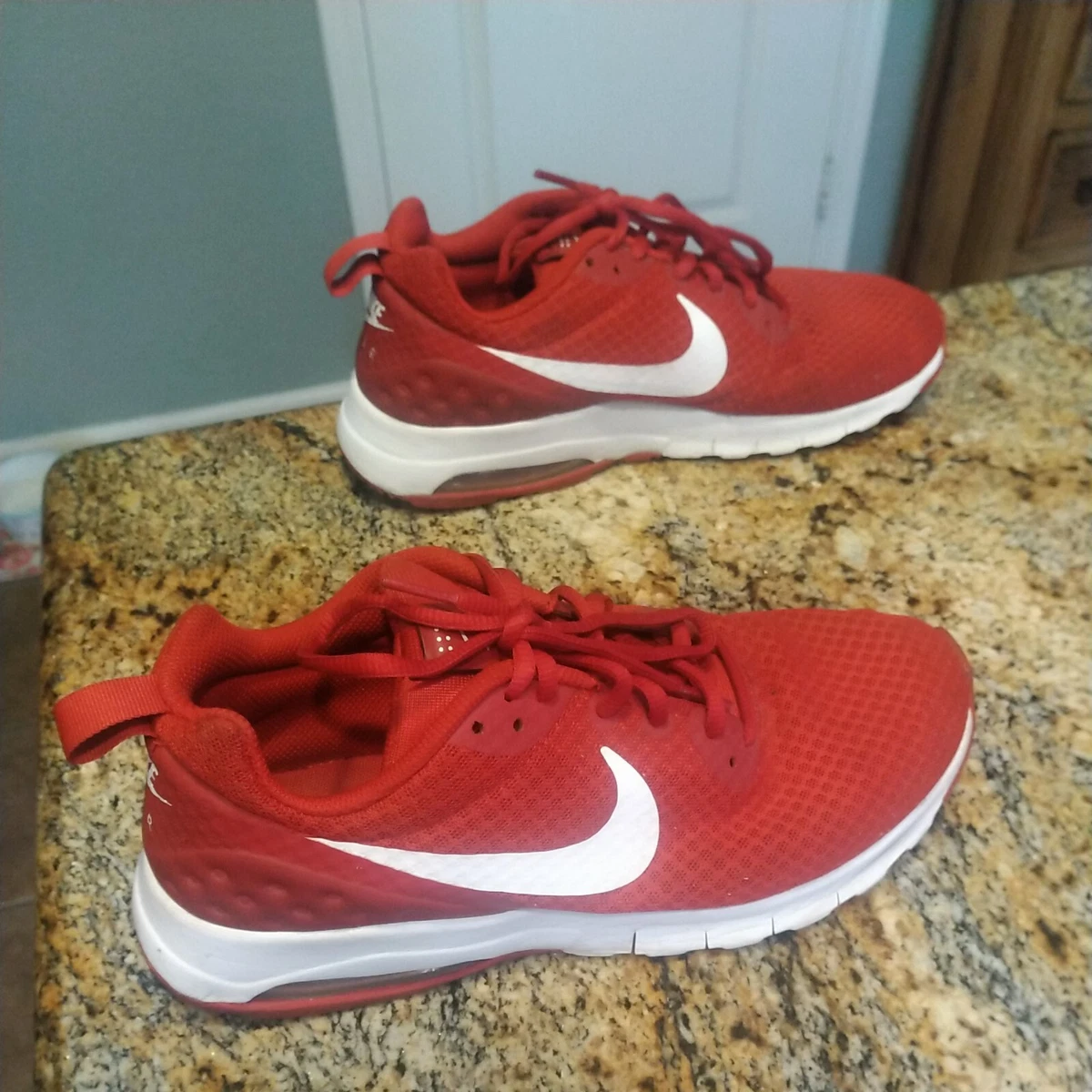 Red nike air max motion hotsell