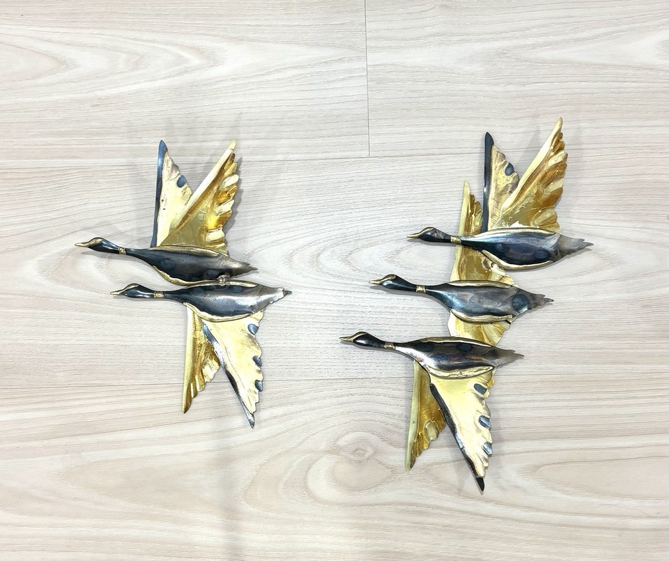 Actual vintage 1960s die-cut flying geese metal wall art — the kind of MCM piece that sells out instantly at estate sales.