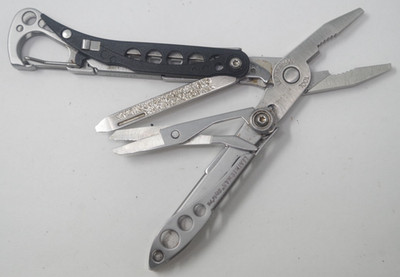 Retired Leatherman Style PS Keychain Multi-Tool Plier Pocket Knife - TSA Auction