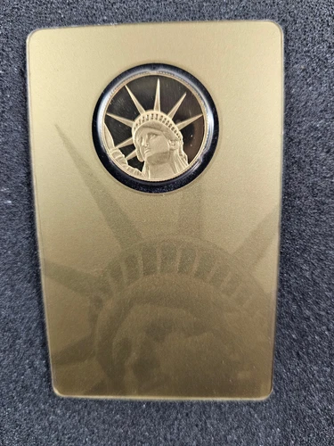 🌟 PAMP Suisse Solomon Islands 1/4 oz Gold Statue of Liberty Round Elizabeth