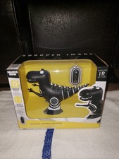 robotosaurus sharper image infared control black dinosaur, it can move forward