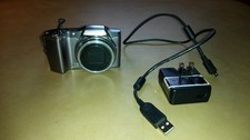 Olympus SZ-12 digital camera w/ rechargeable battery usb cable and card