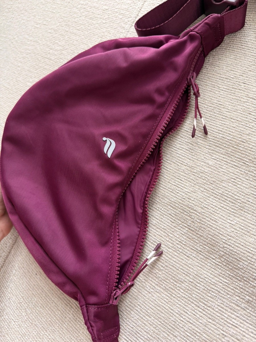 Fabletics Purple Crescent Sling Bag Adjustable Strap Zip Closure