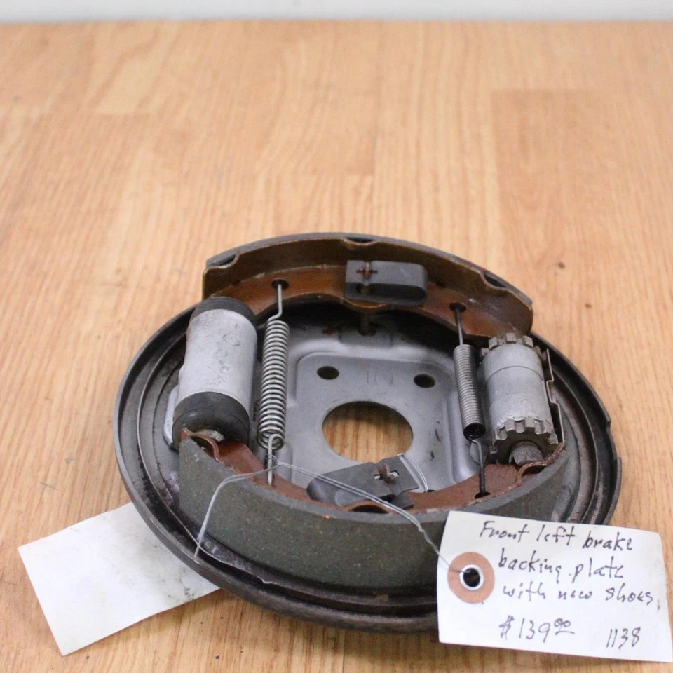 1984 HONDA TRX 200 Front Left Brake Plate Panel Cylinder Assy & New Brake Shoes - Image 2 of 4