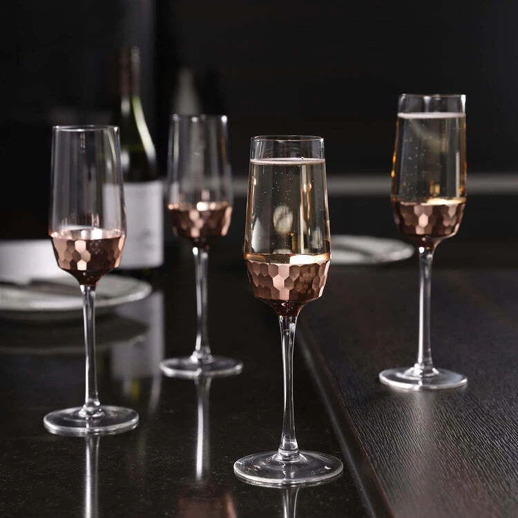 Four modern champagne flutes