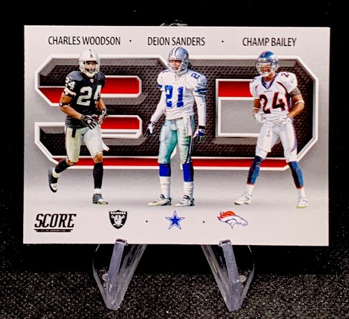 2021 Panini Score 3D Charles Woodson/Deion Sanders/Champ Bailey #3D5 - Bild 1 von 2