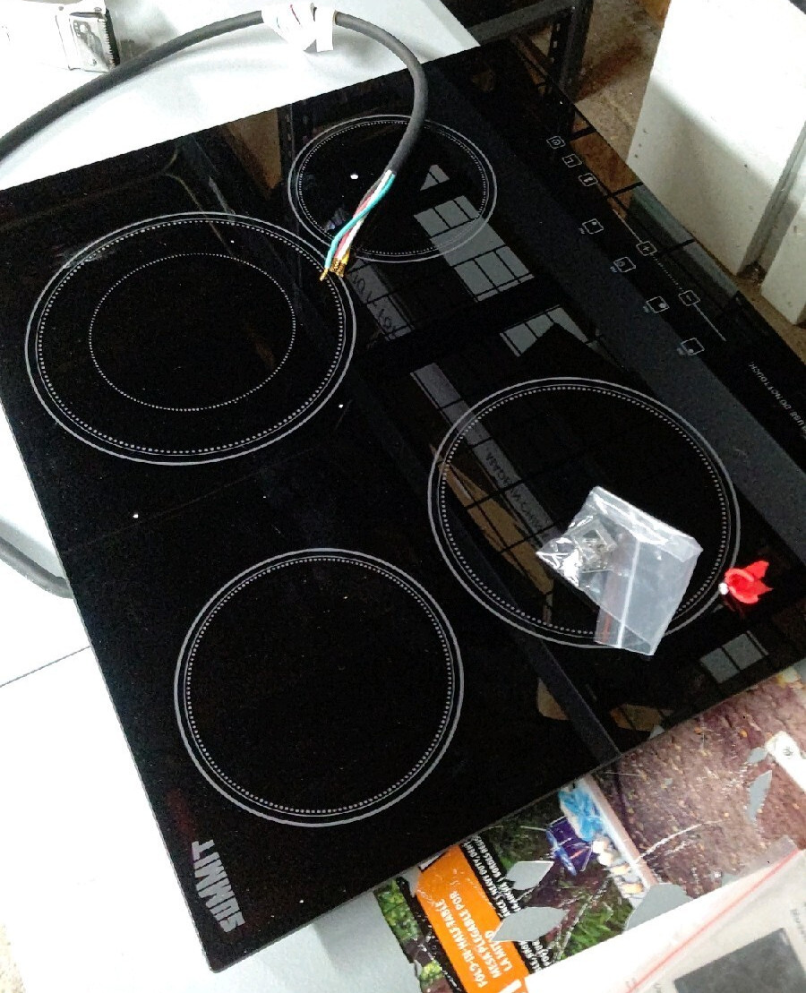 Summit Appliance CR4B23T5B 24 Wide 230V 4-Burner Radiant Cooktop in Black Smooth