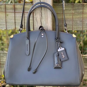 coach cooper carryall with rivets