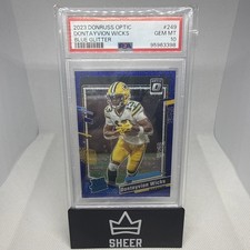 2023 Donruss Optic #249 Dontayvion Wicks RC Blue Glitter Rated Rookie PSA 10