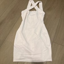 Nookie baby pink bodycon mini dress with cut out detail cross neck