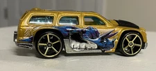 2009 Hot Wheels Rollin Thunder Gold Triceratops Dinosaur Loose