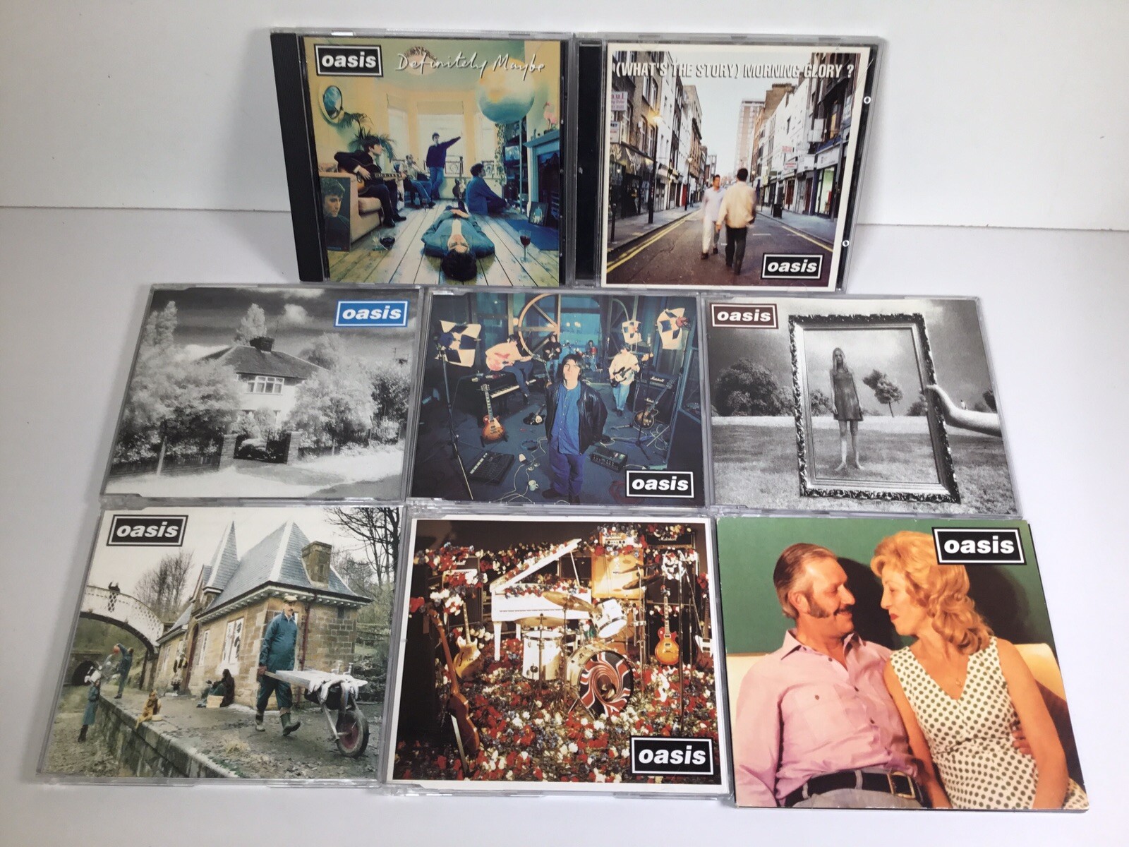 Oasis CD Bundle 2 Albums and 6 CD Singles including Definitely Maybe  Wonderwall