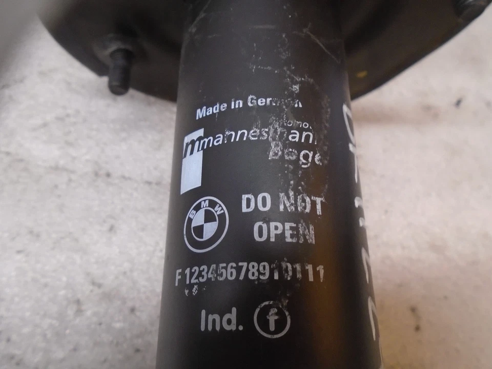 Amortiguador trasero izquierdo del lado del conductor BMW 325Ci 2001-2005 OEM DK712241 Foto 3 de 4