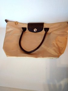 tanger outlet purses