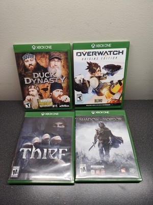 Lot of  4 Xbox One Games THIEF, SHADOW OF MORDOR, OVERWATCH, DUCK DYNASTY 
