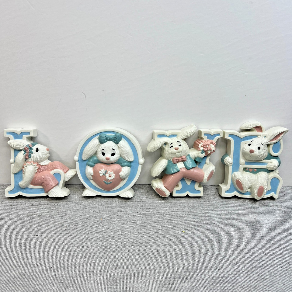 A legit 1991 Burwood Products bunny plaque set — the kind of adorable vintage kitsch that sparks instant nostalgic recognition and looks great in a cottagecore space.
