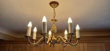 Gold Coloured Brass Chandelier 7 arm ceiling light in excellent condition.