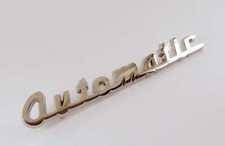 Classic Austin Mini Automatic Chrome Cast Metal Script Badge, BMC part; 24B2639