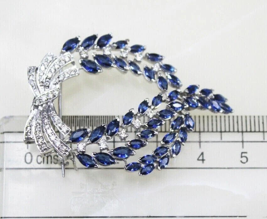 Broche prendedor de plata de ley 925 simulado de zafiro azul enchapado en oro blanco de 18 k Foto 3 de 4