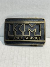 1976 SOLID BRASS K - M PIPE SERVICE BELT BUCKLE MADE IN THE USA
