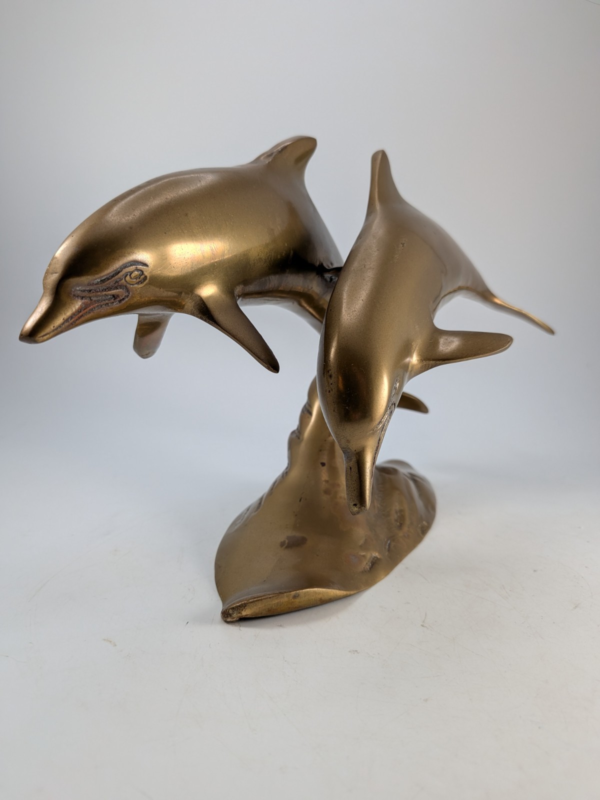 Vintage Brass Dolphins Swimming Figurine.  11" Wide.