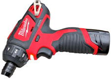 Milwaukee M12 BD Driver With Battery And Charger, light use only see pictures.