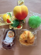 LOT SQUISHY LOW RISING. Most squishies will be in new packaging. Defects shown.