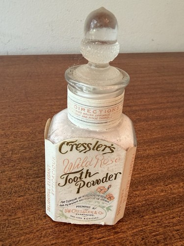 Antique Cressler’s Wild Rose Tooth Powder Embossed Bottle Clean And Full