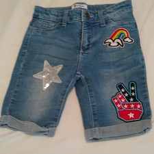 Tractr girls Size 8 denim shorts with patches.