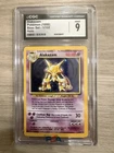 1999 Pokemon Alakazam CGC 9 Mint Holo #1 Base Set