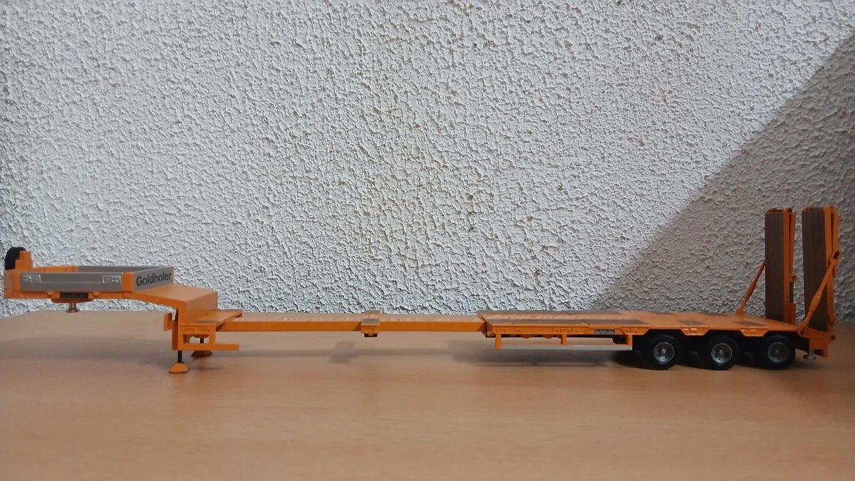 Tekno remorque porte-engins surbaissée Goldhofer orange Échelle: 1:50